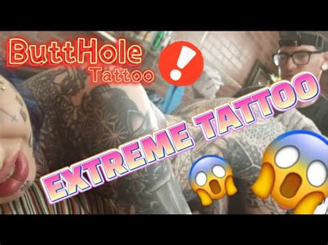 tattooed asshole|GETTING HER BUTTHOLE TATTOOED .